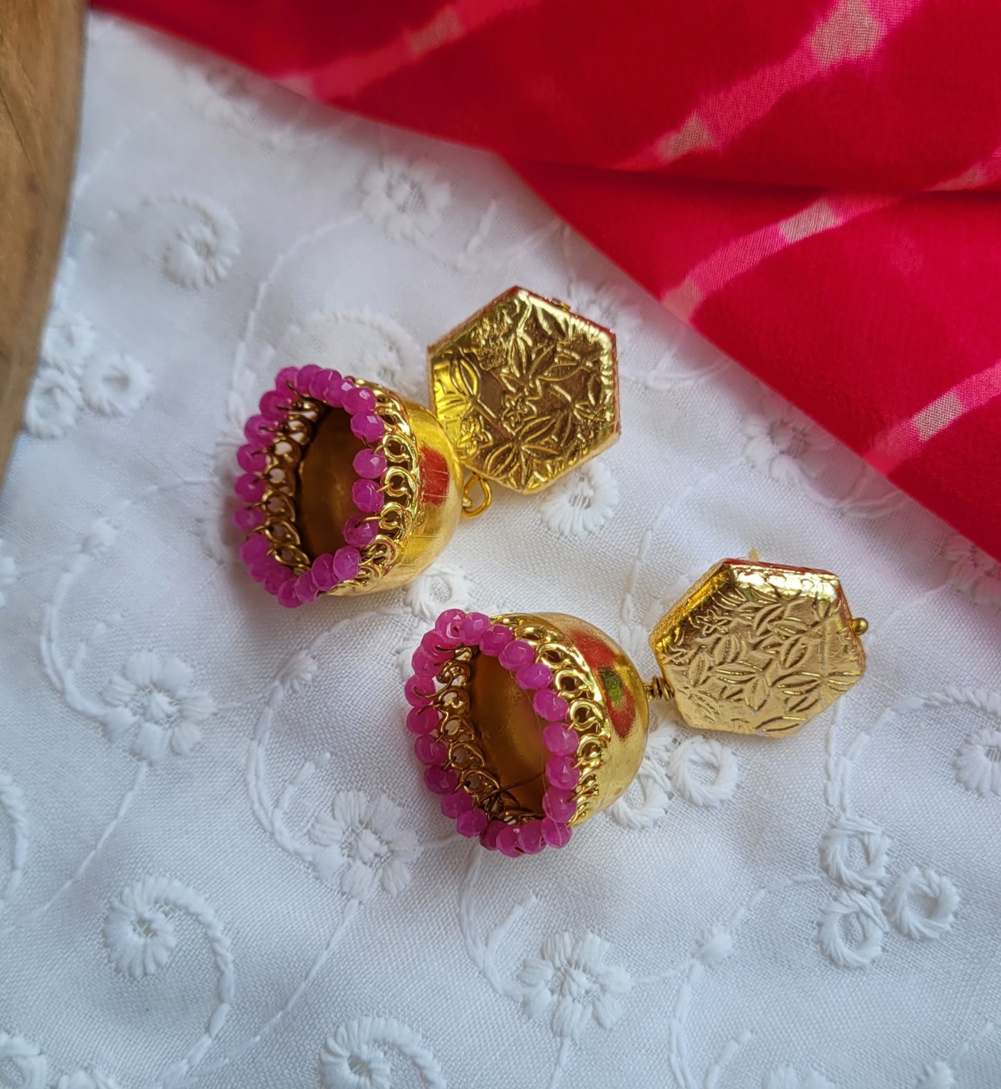 Stud golden jhumki with pink beads