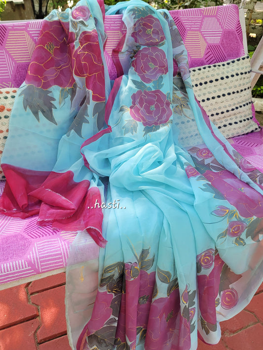 Hasti handpainted floral blue chiffon saree
