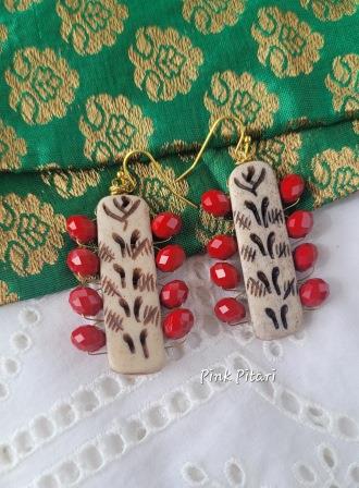 Red and off white earrings