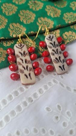 Red and off white earrings