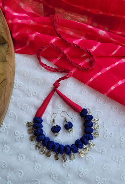 Jewelry set with blue beads and silver accents