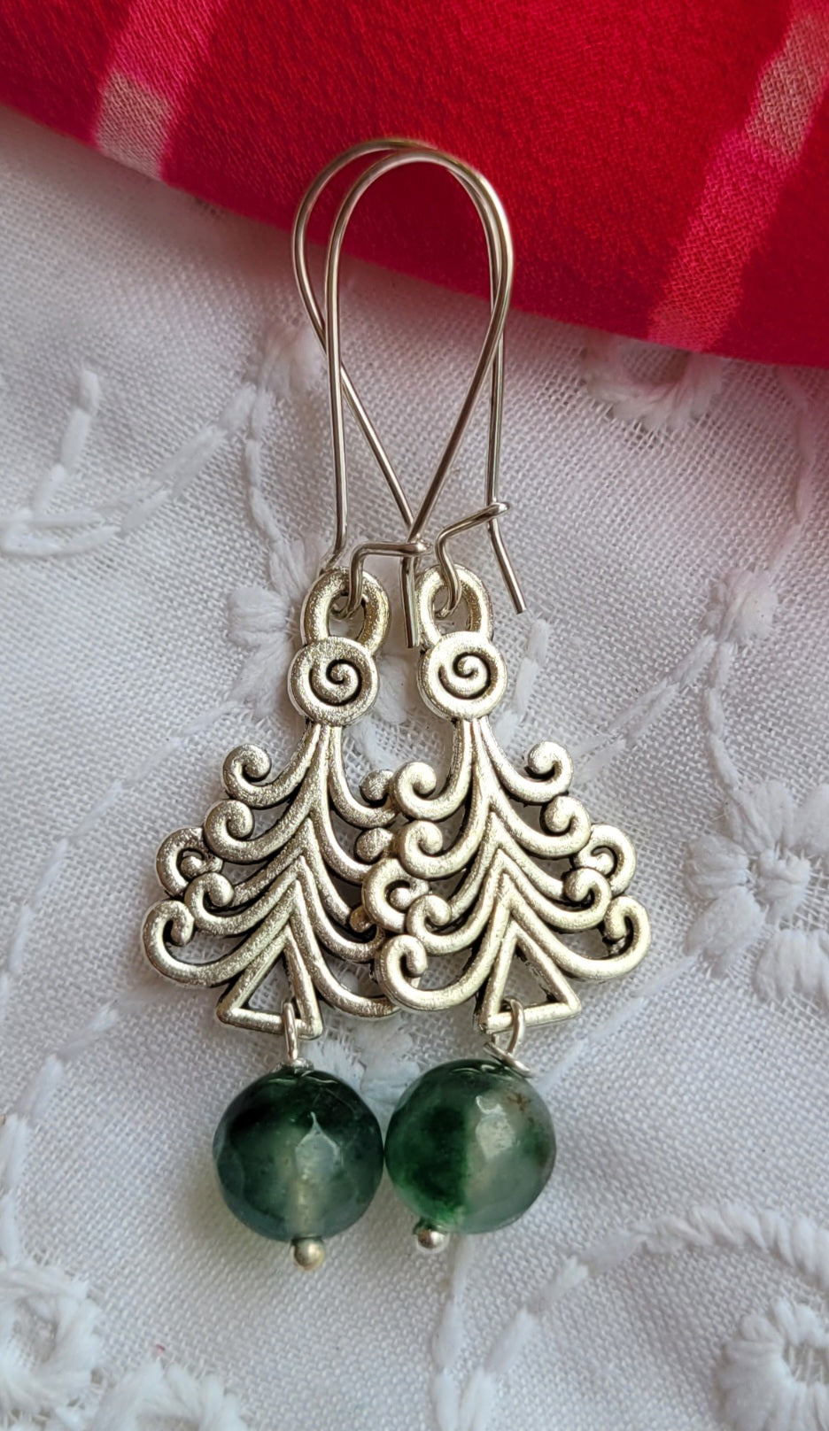 Silver earrings with green beads 