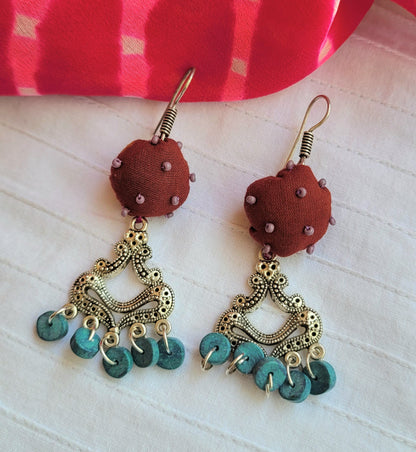 Pair of earrings with maroon fabric balls and turquoise beads 