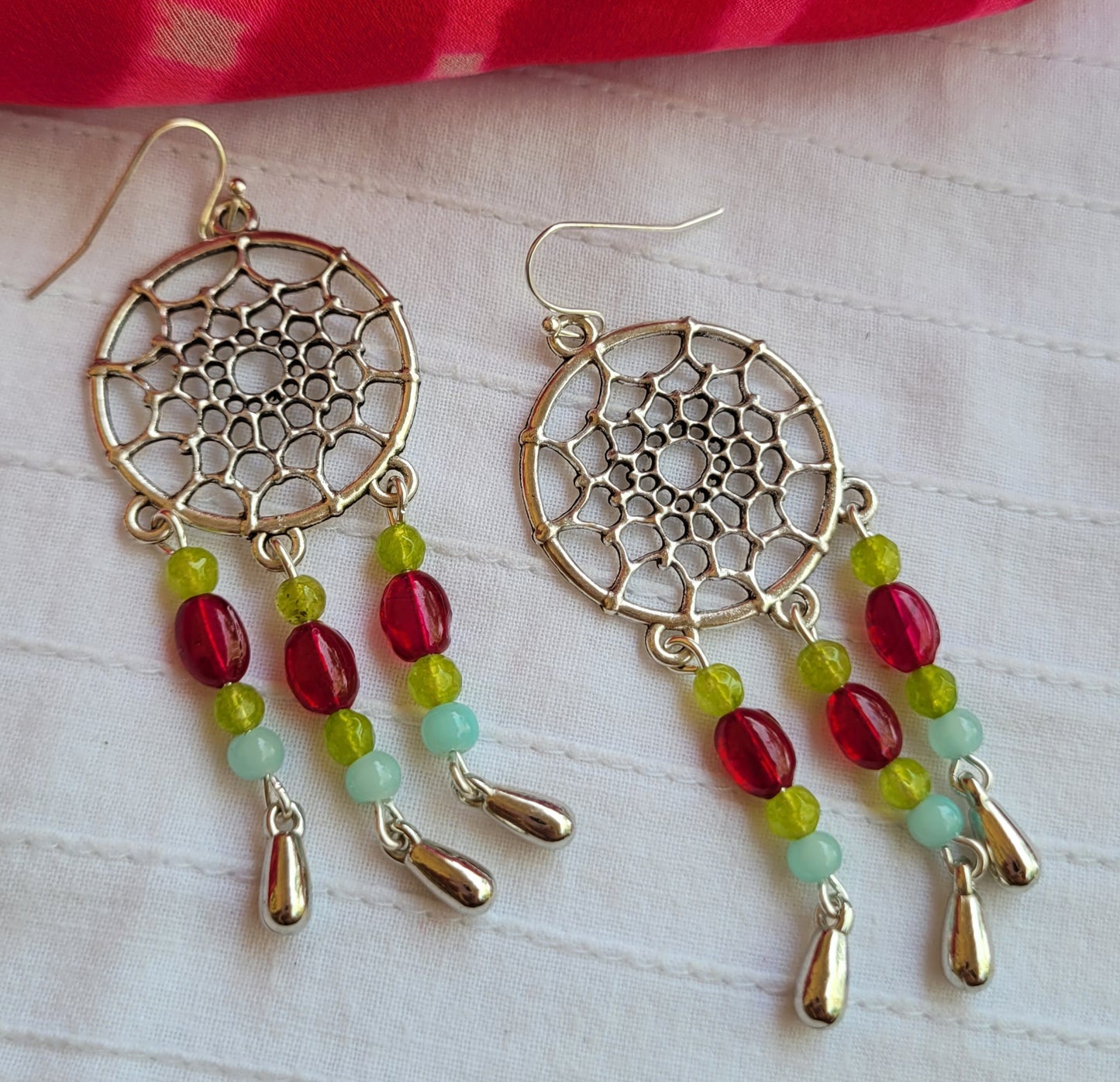 Pair of dreamcatcher earrings with colorful beads 