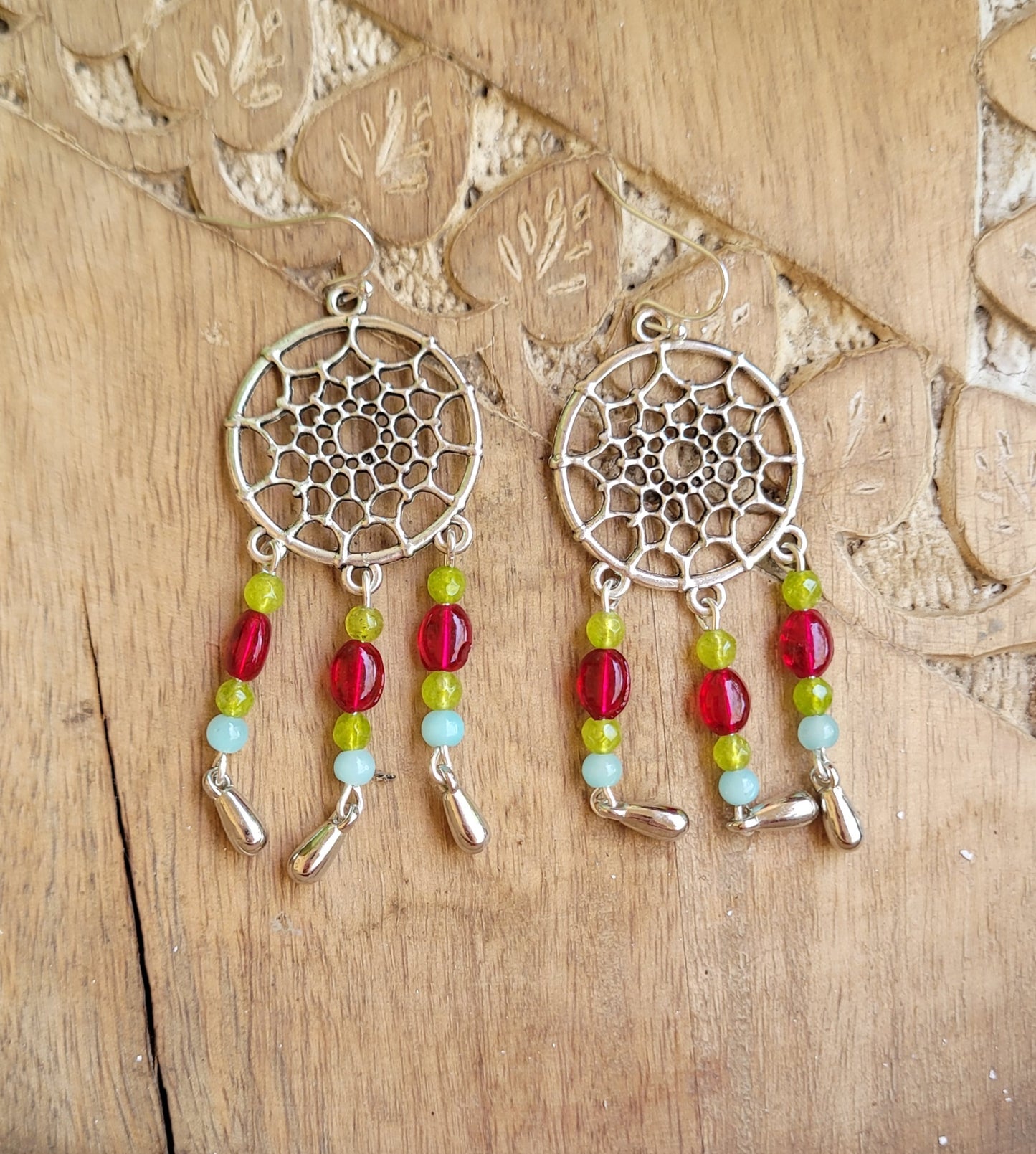 Pair of silver dreamcatcher earrings with colorful beads 