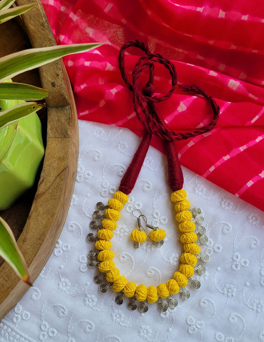 Yellow beaded necklace and earrings 