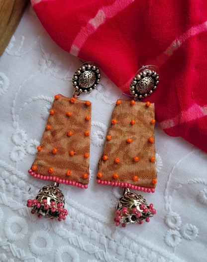 Decorative earrings with orange and pink beads