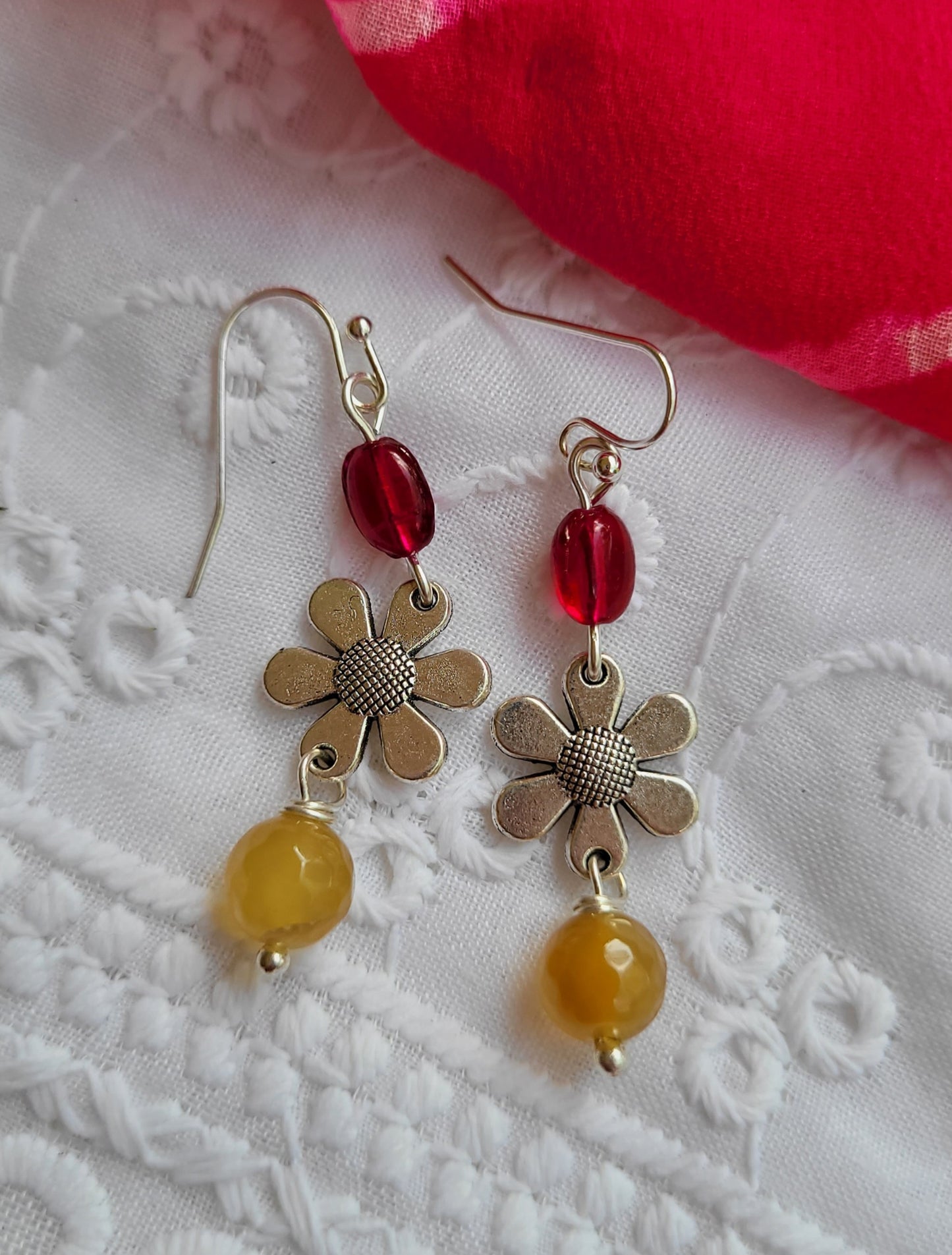 Flower-shaped earrings with red and yellow beads 