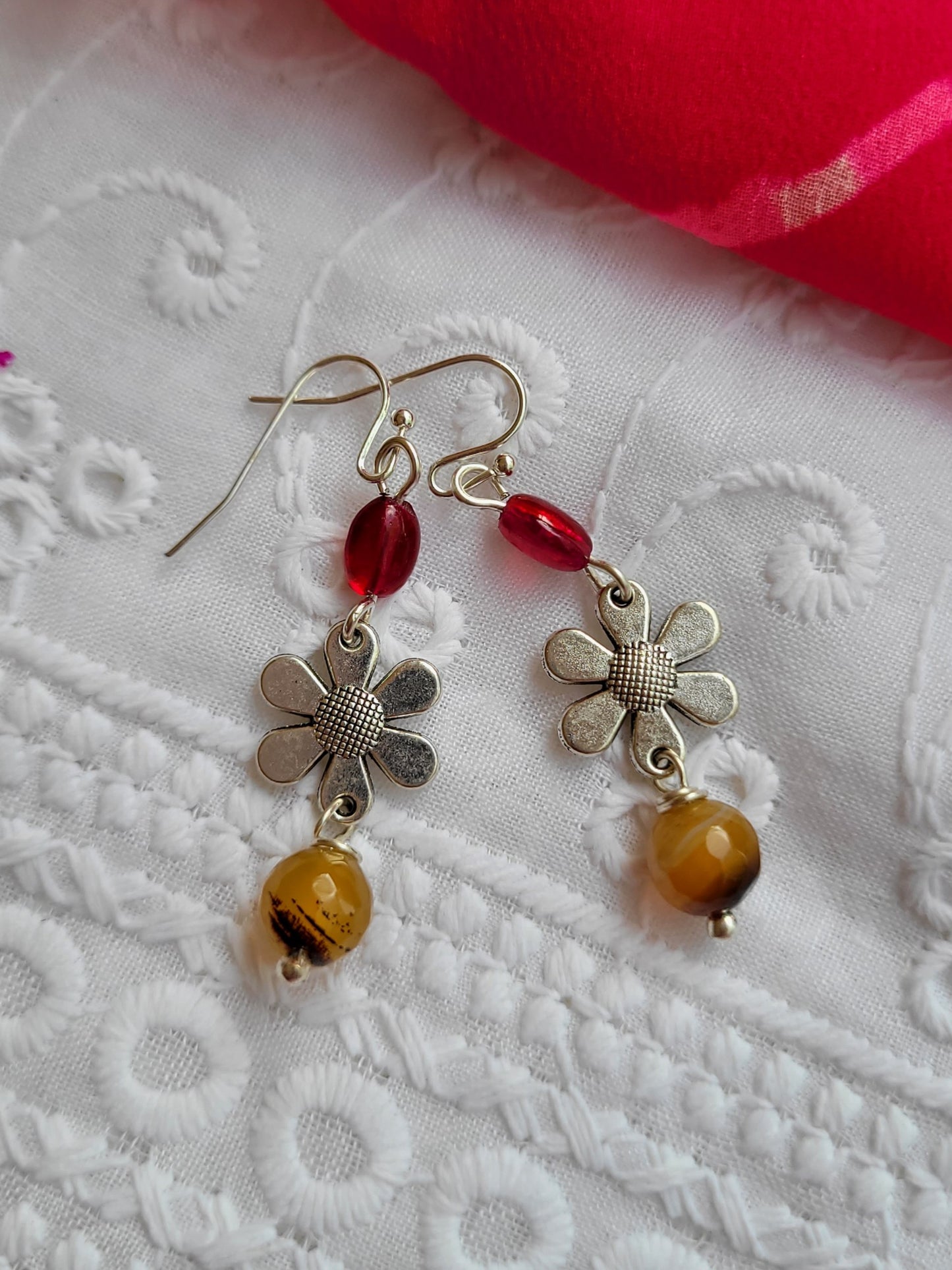 Flower-shaped earrings with red and yellow beads 