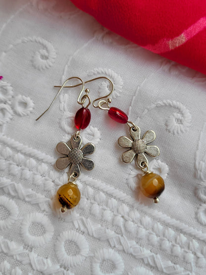 Flower-shaped earrings with red and yellow beads 