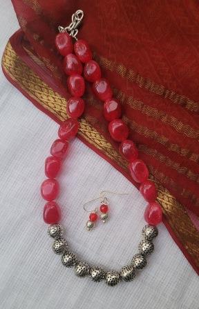 Red beaded necklace and earrings
