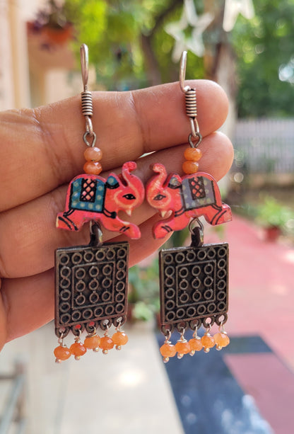 Elephant charm earrings