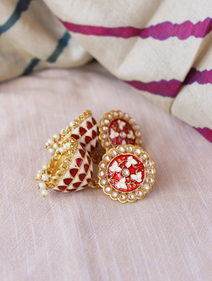 red jhumka earrings